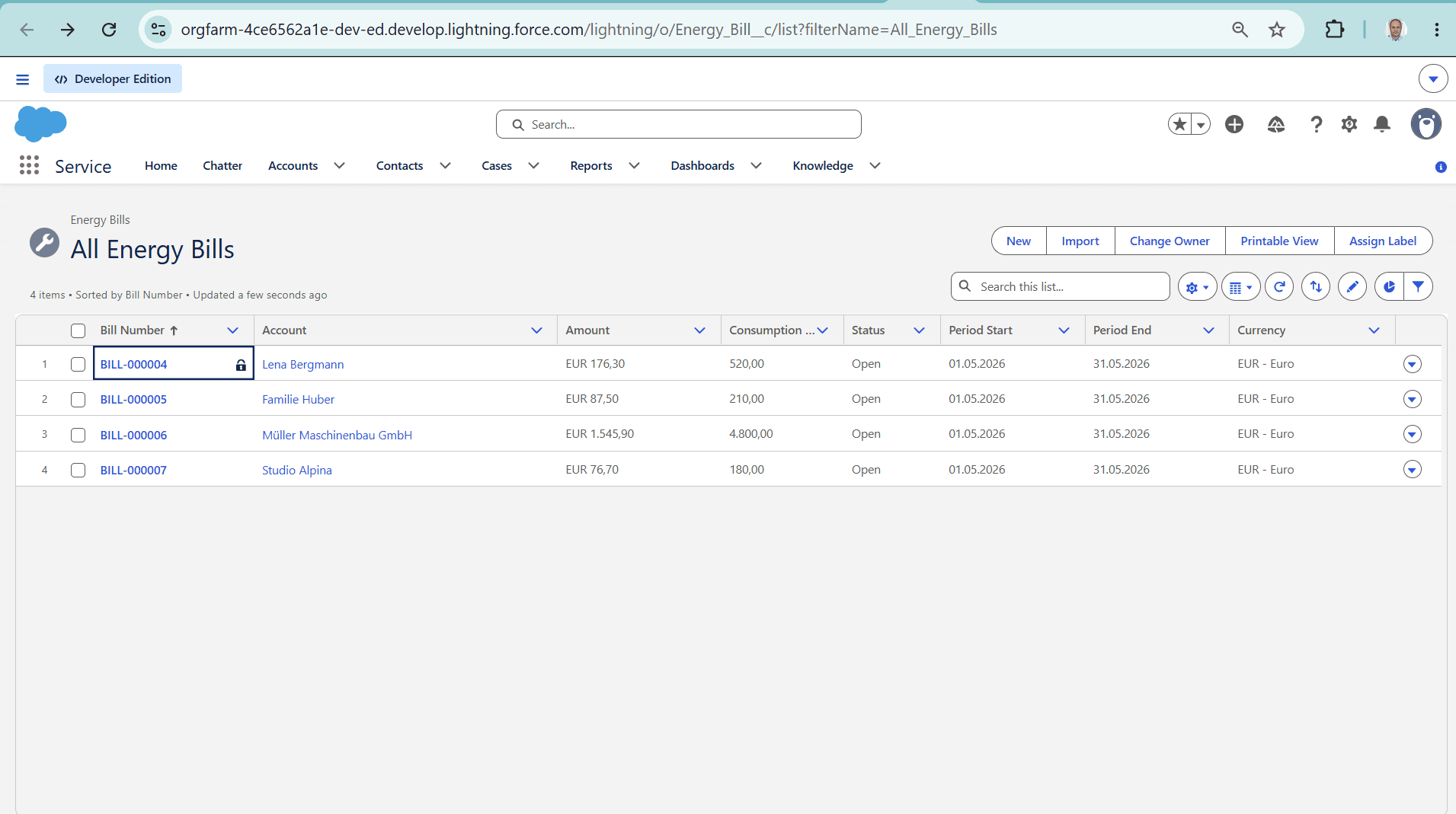 The Energy Bill records in Salesforce — BILL-000004 for Lena Bergmann, €176.30, 520 kWh, alongside the other DACH customers